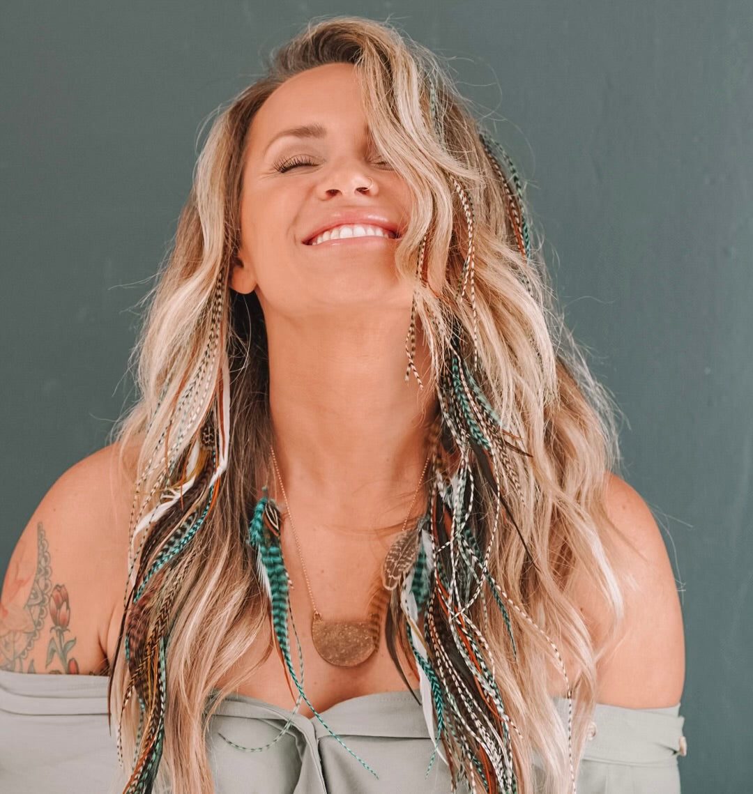 Unlock the Magic of Feather Hair Extensions: Energetic Benefits and Styling Ideas